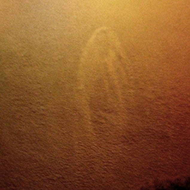 picture of stains and shadows on a wall that were said to resemble the virgin mary.